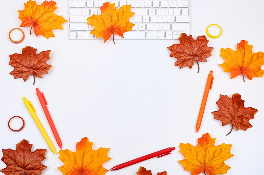 Desk with notebook laptop and presentation outline templates